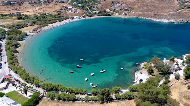 Panoramic aerial summer day view of the bay and beach of Otzia, Kea Tzia Island, Greece, with turquoise sea