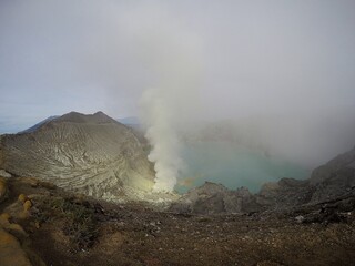Beautiful panoramic view of Ijen Volcanic crater in the morning scene © sahL