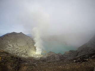 Beautiful panoramic view of Ijen Volcanic crater in the morning scene © sahL
