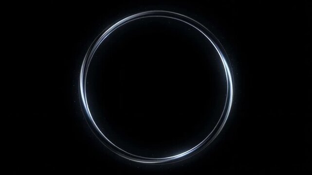 A glowing circular shape with a subtle gradient on a black background, creating an ethereal and futuristic atmosphere