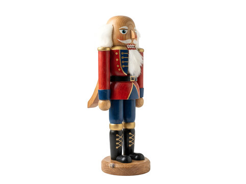 Vintage wooden nutcracker soldier, classic Christmas nutcracker in red and blue uniform, traditional holiday toy figurine isolated on Transparent Background