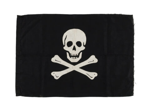 Black fabric flag with white skull and crossed bone design isolated