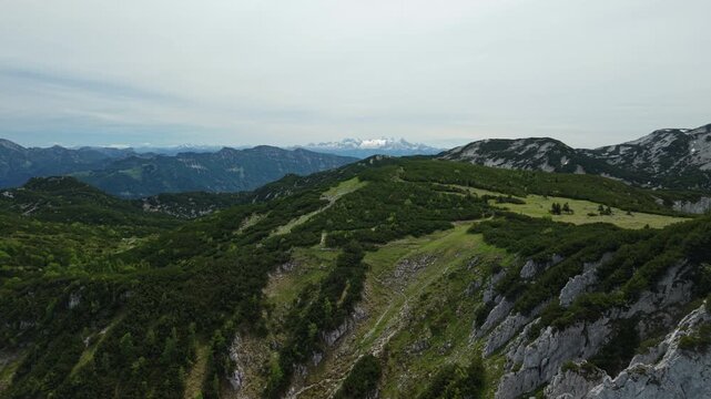 Aerial view of Feuerkogel mountain plateau with distant Dachstein glacier