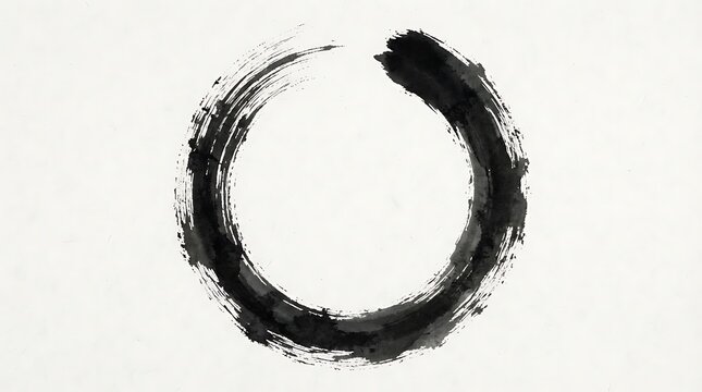 Elegant enso circle brushstroke in black ink on a white background representing zen buddhism and minimalist artistic expression