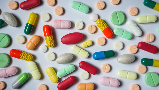 Top view of several colorful antibiotics and health supplements. Medical equipment. 