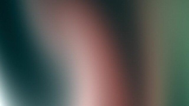 Abstract gradient background with soft light flare and grainy texture.