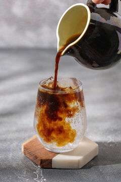 Espresso tonic. Trendy coffee drink in glass