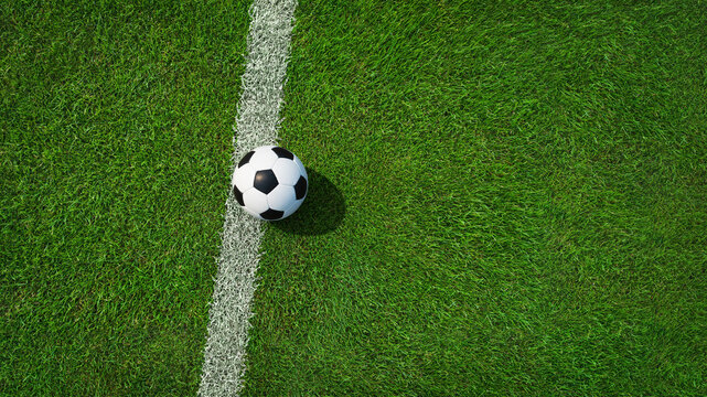 Textured soccer game field with soccer ball - center, midfield view from above.