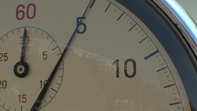 Close up of analogue stopwatch going from 0 to 10 seconds