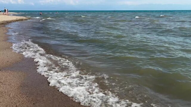 Shore of the Issyk Kul lake on sunny day Kyrgyzstan