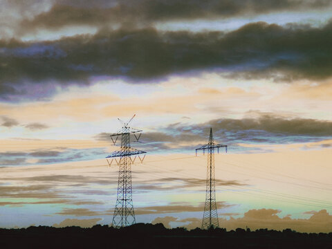 high voltage power lines in the field
