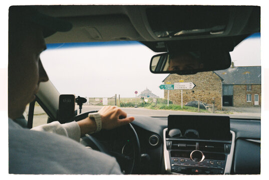 Driving toward Mont Saint Michel from inside a car