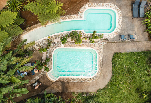 Costa rica resort pools with lush tropical plants