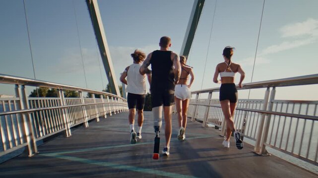 Adaptive athlete runs with fitness group along riverside bridge