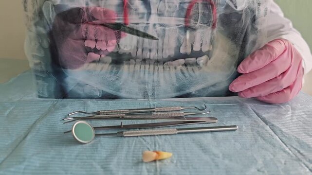 Dentist prepares tools for dental procedure in clinic setting