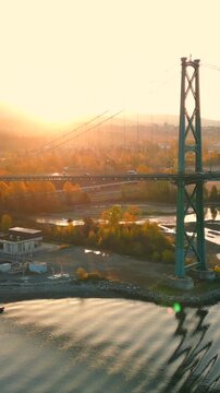 Aerial view of Lions Gate Bridge, Vancouver harbour and West Vancouver at dawn