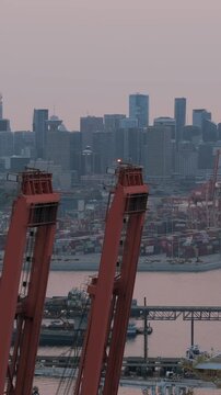 Aerial view of Port of Vancouver, harbour and mountains on the background