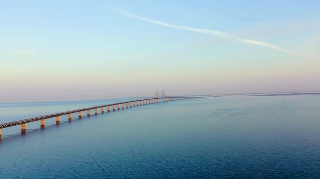 Oresund bridge. A long tunnel bridge with an artificial island between Sweden and Denmark.. Drone footage