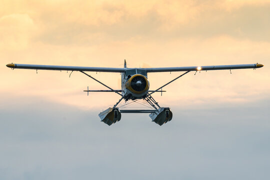 A de Havilland Canada DHC-2 Beaver amphibious floatplane during a beautiful sunset. 