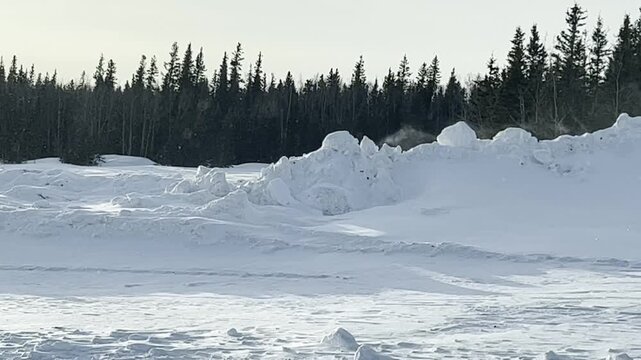 Wind blowing snow on a sunny winter day in interior Alaska. 