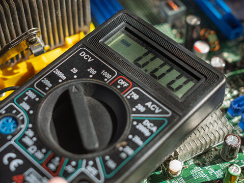 Digital Multimeter Testing Electronic Circuit Components