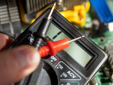 Digital Multimeter Measuring Voltage in Electronics