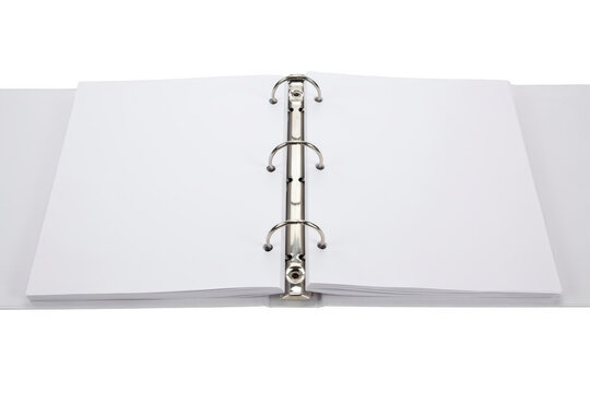 An open three ring binder notebook with blank white pages lying flat on a solid black background, showing metal rings and paper texture