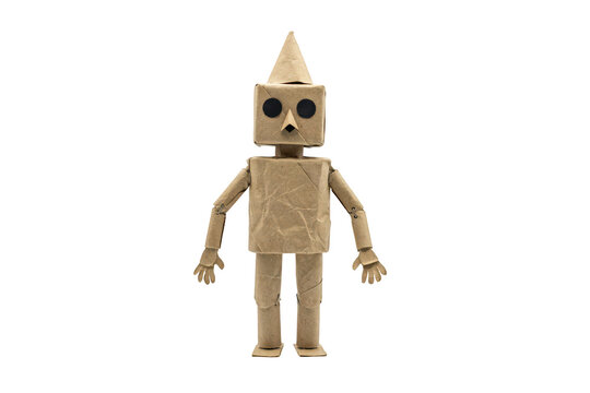 A whimsical paper puppet constructed from brown crumpled paper, featuring a pointed hat, square head, and jointed limbs on a black background