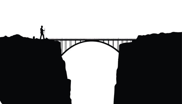Man silhouette standing near edge of deep canyon cliff looking across suspension bridge representing adventure travel exploration journey and overcoming obstacles in life.