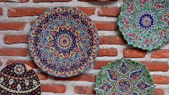 Several a decorative Iranian wall plates, handcrafted using a traditional painting techniques.