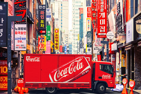 South Korea, Busan - March 30, 2026: Coca-Cola truck on the street of the old city center