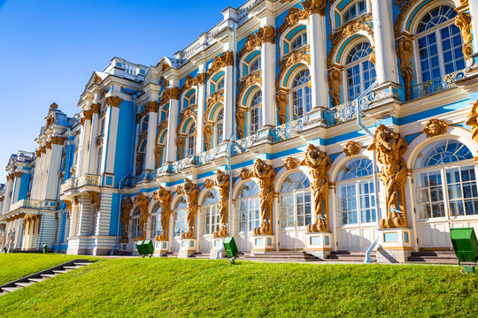 Grand palace gleams under bright blue sky