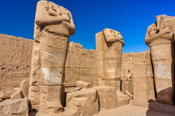 Fototapeta premium Karnak Temple Complex in Luxor – Ancient Egyptian Columns, Hieroglyphs and historic landmark, Egypt