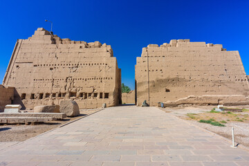 Fototapeta premium Karnak Temple Complex in Luxor – Ancient Egyptian Columns, Hieroglyphs and historic landmark, Egypt