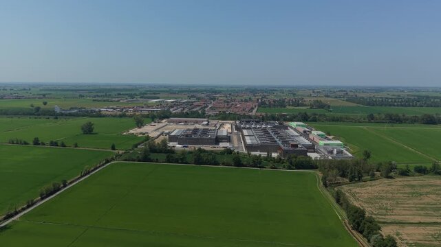 Aerial view of the Stack Infrastructure MIL04 data center campus in Vellezzo Bellini, set within the wider landscape of Pavia Province, Italy