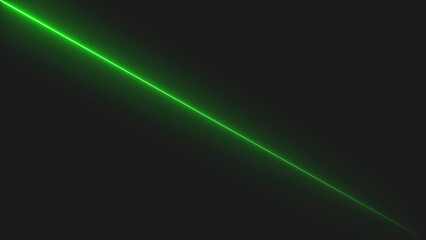 A bright glowing green laser beam diagonal line crossing through a dark black background creating a futuristic tech effect for digital design and modern light art © Alamin stock