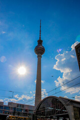Berlin TV Tower viewed from below, alongside the sun shining directly into the camera © Jakobs Studio