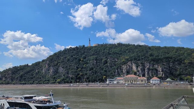 Gellert Hill Budapest offers stunning panoramic views. The lush green landscape meets the beautiful Danube River. Enjoy nature and history in one frame.
