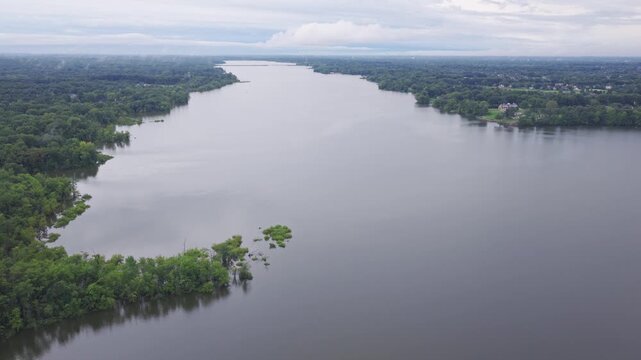 Drone aerial of Hoover Reserver near Westerville, OH and Big Walnut Creek by Columbus, Ohio body of water and manmade lake with trees, expensive house homes, and river ways along midwestern shorelines