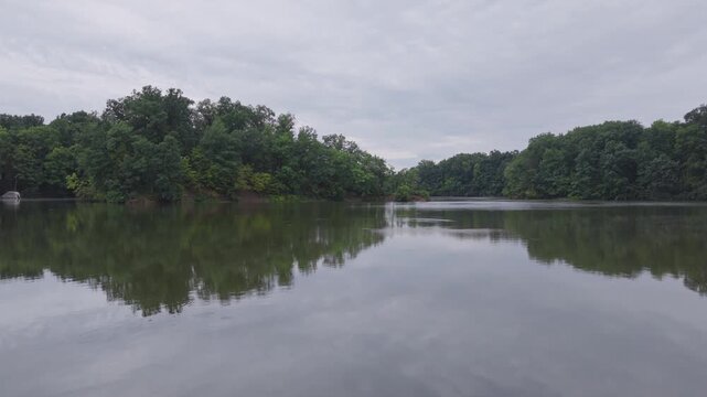 Drone aerial of Hoover Reserver near Westerville, OH and Big Walnut Creek by Columbus, Ohio body of water and manmade lake with trees, expensive house homes, and river ways along midwestern shorelines