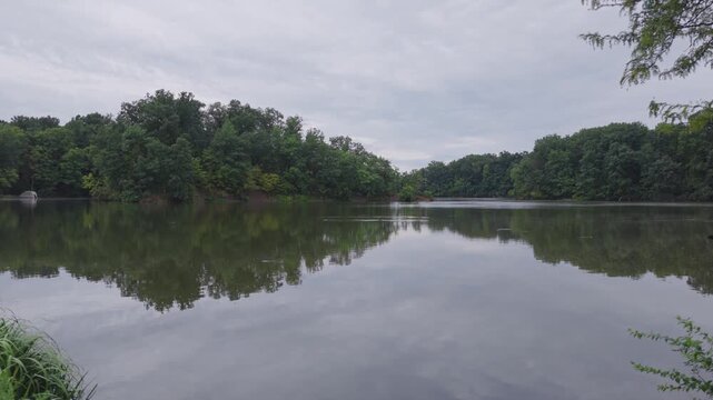 Drone aerial of Hoover Reserver near Westerville, OH and Big Walnut Creek by Columbus, Ohio body of water and manmade lake with trees, expensive house homes, and river ways along midwestern shorelines