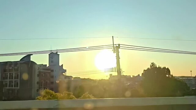 Passing by a shinkansen high speed train in a japanese rural city at sunset, track, Rural Travel Journey, Train Railway Transportation, Passenger Window POV