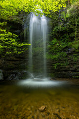 Obraz premium Lamiña Waterfalls, also Known as Úrsula Waterfalls, in Saja-Besaya Natural Park, Cantabria, Spain