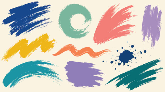 Set of colorful grunge brush strokes on a light background.
