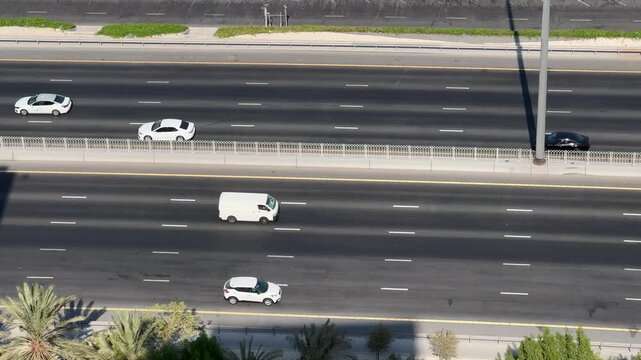 High angle view of highway traffic along the waterfront marina in Manama, Bahrain.