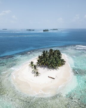 Small tropical Palm Island, Paradise, drone shot, San Blas, Guna Gala, Panama
