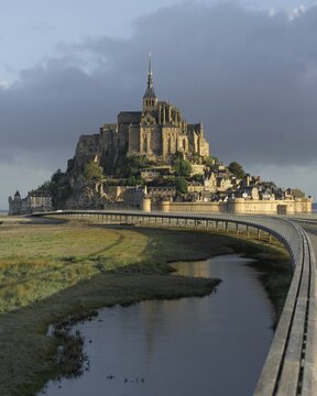Le Mont-Saint-Michel with pedestrian bridge, Manche department, Normandy, France