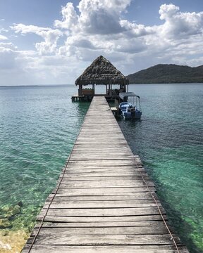 Jetty with water hut, Lago Peten Itza, Guatemala
