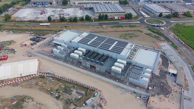 Aerial view of a modern data center facility in Siziano, Italy