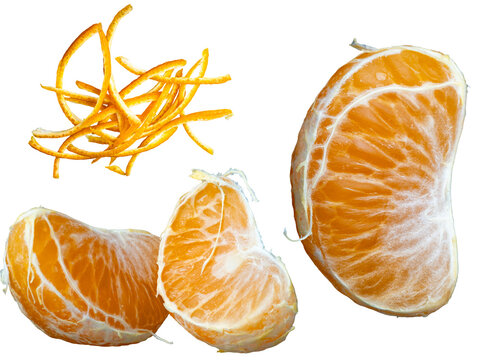 Fresh mandarin orange segments with shredded orange zest isolated on transparent background